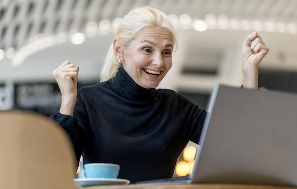 senior woman celebrating